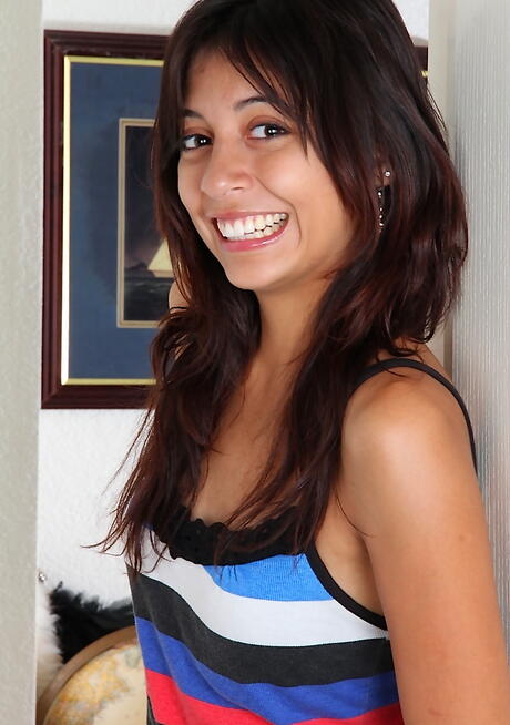 Gracile latina teen Rocky in undies exhibiting small tits and spreading her legs 
